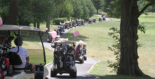 Golf Carts with Pink Balloons at the Annual Edge Golf Outing