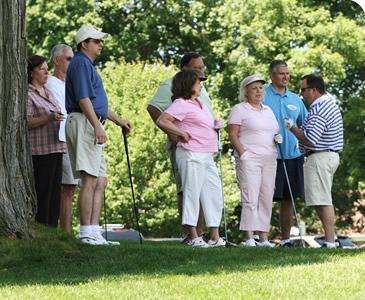 Adrienne Giannone, President and CEO, Edge Electronics, golfing